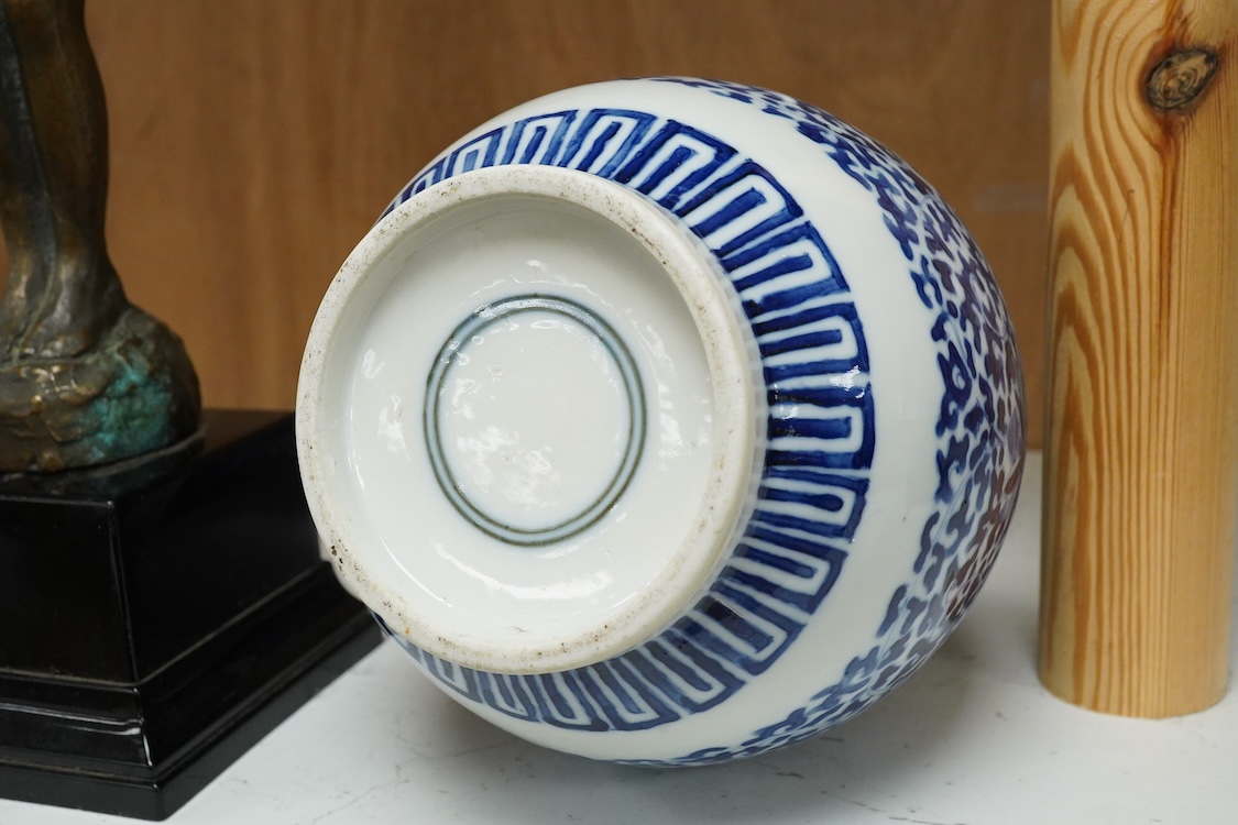 And early 20th century Chinese blue-and-white double gourd shaped vase, blue ring marks to the base, 29cm high